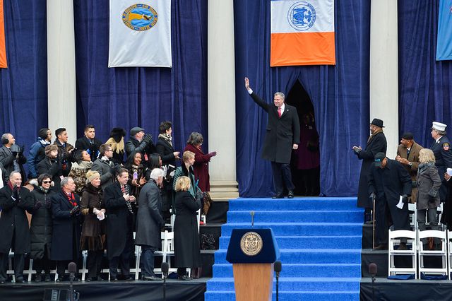 Bill de Blasio waves to a crowd of attendees at his swearing in ceremony on January 1st, 2014, moments before he takes the oath of office as New York City’s 109th mayor.